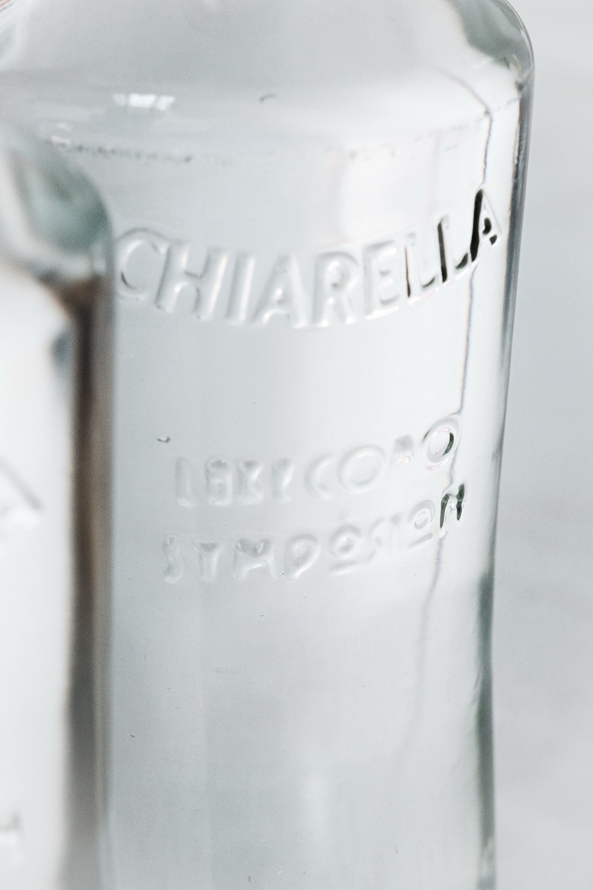 Embossed Chiarella bottle