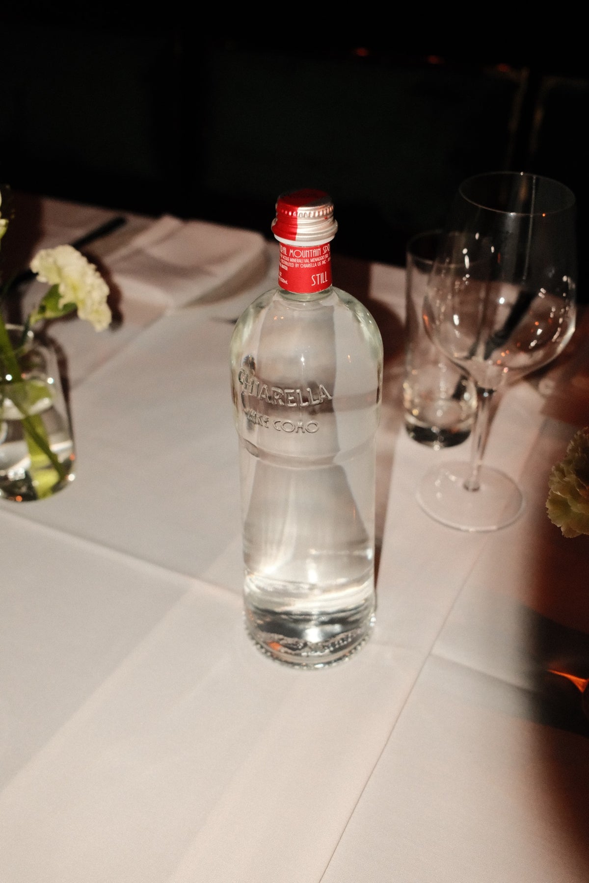 A bottle of Chiarella at a place setting